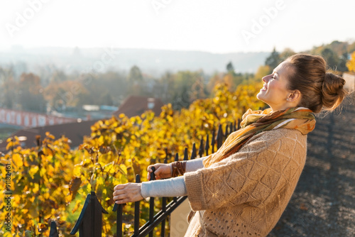 Photography Portrait of brown-haired woman relaxing in autumn outdoors