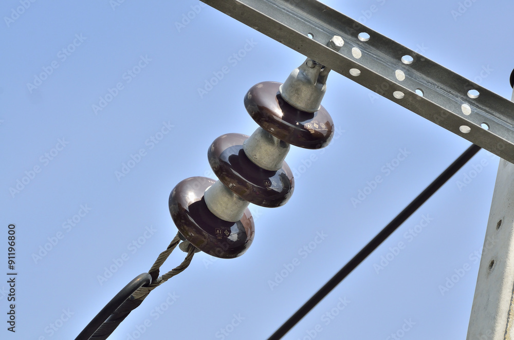 PORCELAIN INSULATOR - SUSPENSION INSULATORS IN NATURE DAY LIGHT (SELECTIVE FOCUS)
PORCELAIN INSULATOR - SUSPENSION INSULATORS IN NATURE DAY LIGHT (SELECTIVE FOCUS)