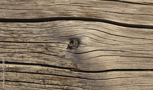 Old shaky wood plank with khot texture