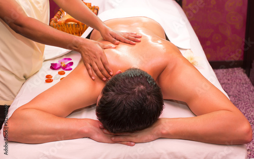 people man engaged in Ayurvedic spa treatment