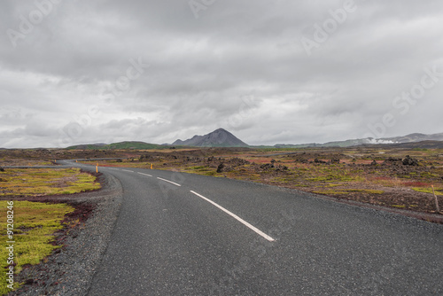 Isolated road and mountain landscape at Iceland, summer time