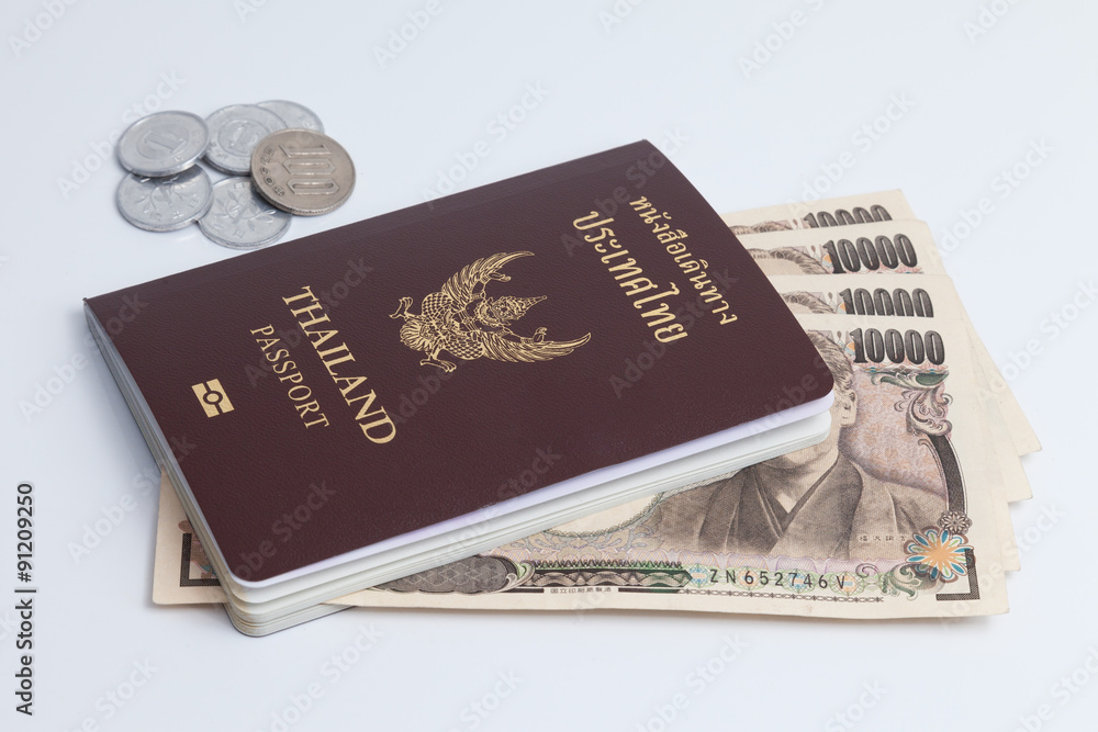 Thai passport with japanese currency. Thai passport with japanese currency.