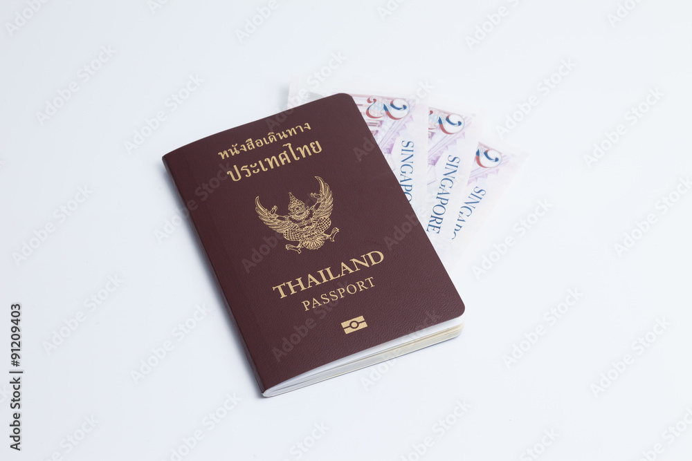 Thai passport with singapore currency Thai passport with singapore currency