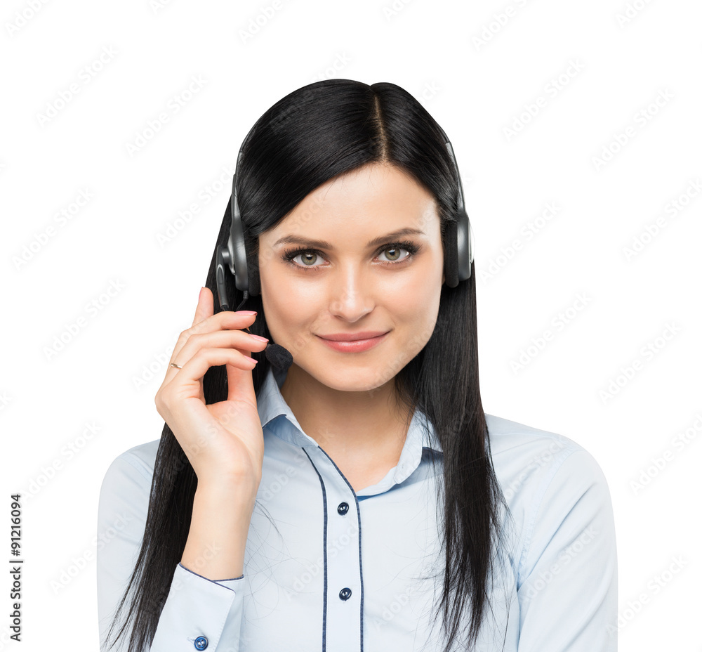 Front view of the smiling brunette support phone operator with headset. Isolated on white background. Front view of the smiling brunette support phone operator with headset. Isolated on white background.