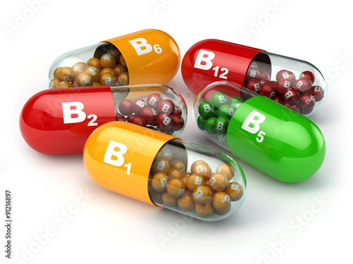 Vitamin B. Capsules B1 B2 B6 B12 on white isolated background. photo