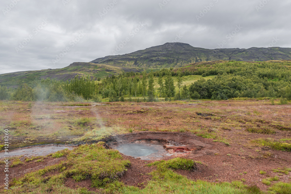 Icelandic natural landscape with hot springs, summer time Icelandic natural landscape with hot springs, summer time