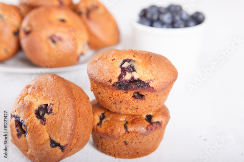 Bblueberry muffins on the white wooden table