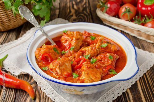 Chakhokhbili - chicken stewed with tomatoes photo