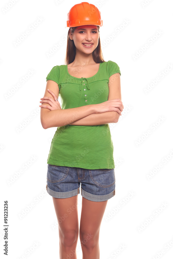 Cute woman isolated on white background in a protective helmet Cute woman isolated on white background in a protective helmet