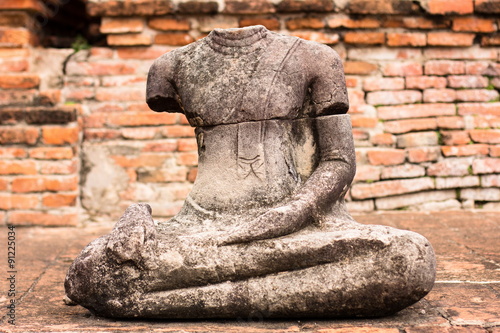 The sculpture was respectfully engaged placed at an ancient temple on the site of the old Royal Palace in Thailand s ancient capital of Ayutthaya.