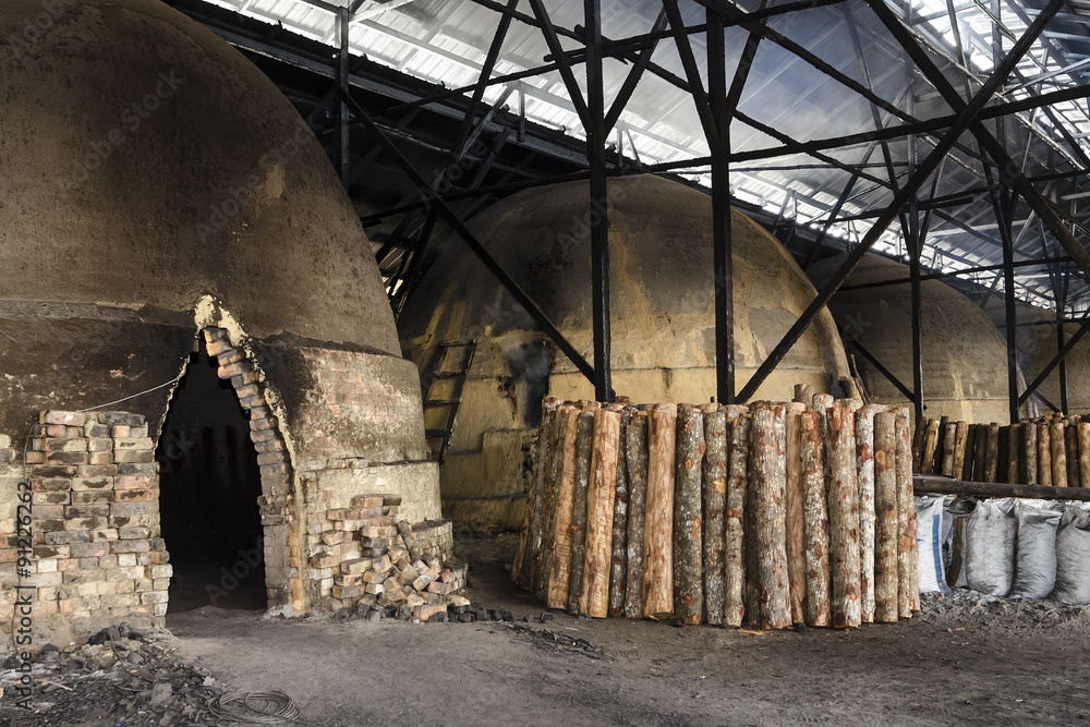 Traditional Charcoal factory, Sepetang, Malaysia - Traditional Charcoal factory in Kuala Sepetang Malaysia Traditional Charcoal factory, Sepetang, Malaysia - Traditional Charcoal factory in Kuala Sepetang Malaysia