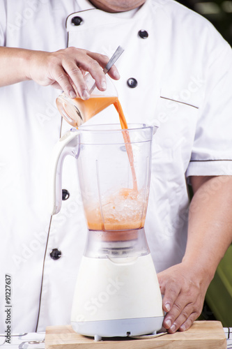 Chef pouring Thai Tea to Blender © kungverylucky
