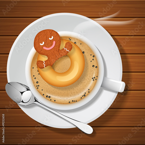ginger bread with doughnut  in cup of hot coffee
