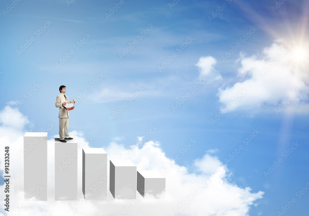 Businessman play drums