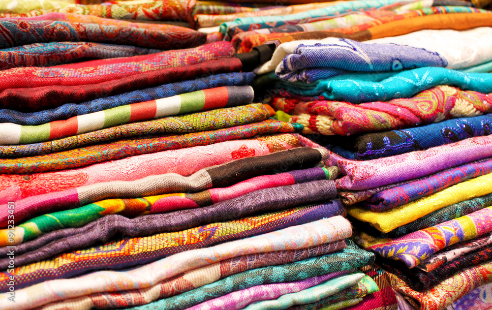 Colorful fabrics and textile close up background
