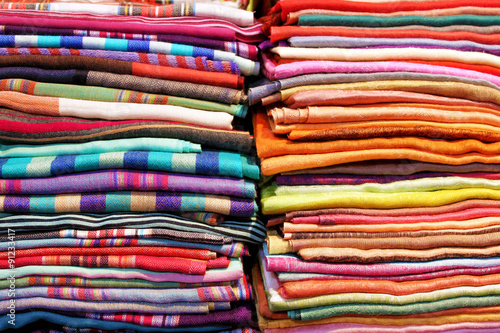 Abstract folded colorful fabrics and textile close up background © niloo