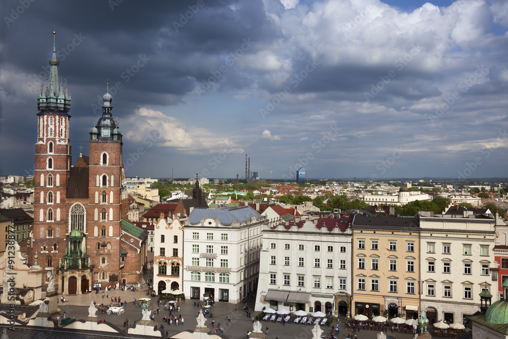 Krakow main square high view with dark cloudy sky, Poland,