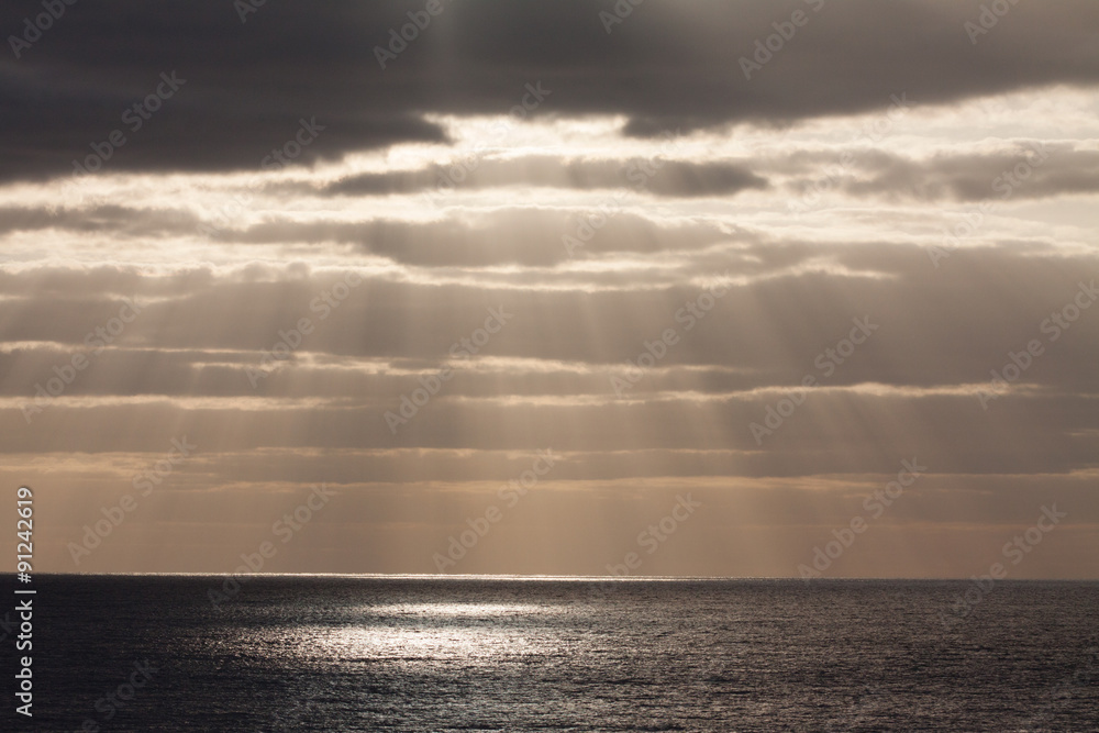 Sun rays over sea