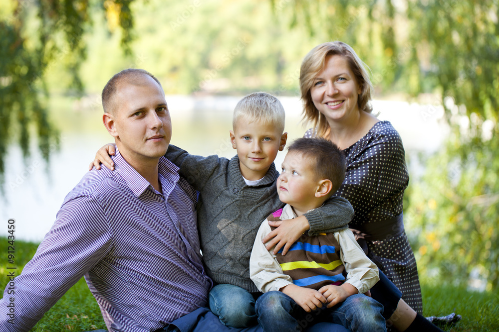 Fototapeta premium Russian family, young parents and two sons