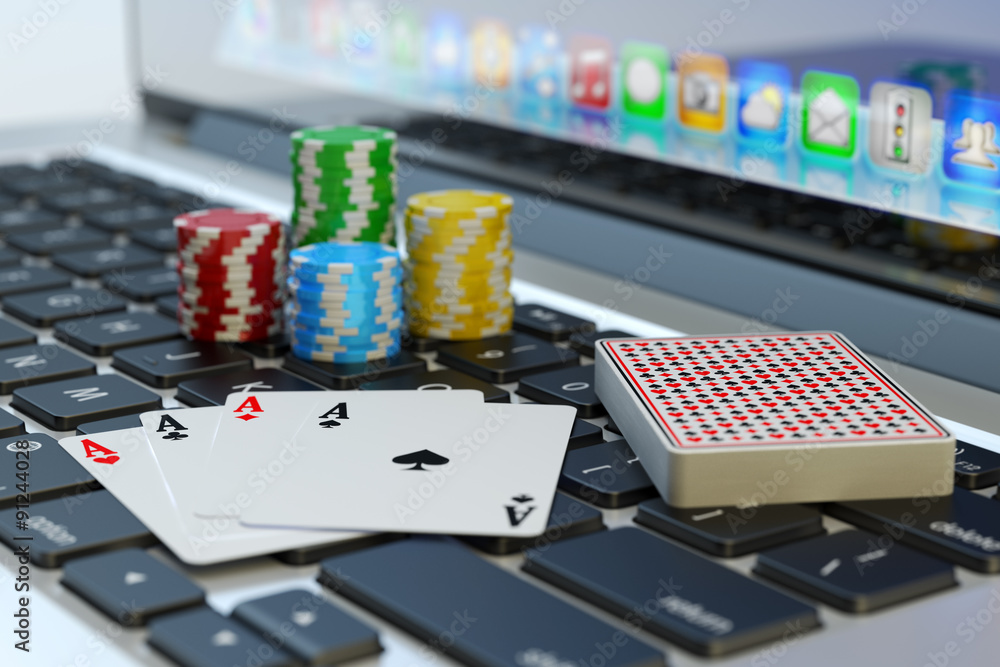 Naklejka premium Online poker, virtual casino and gambling concept, four aces, deck of playing cards and colorful chips on computer laptop keyboard