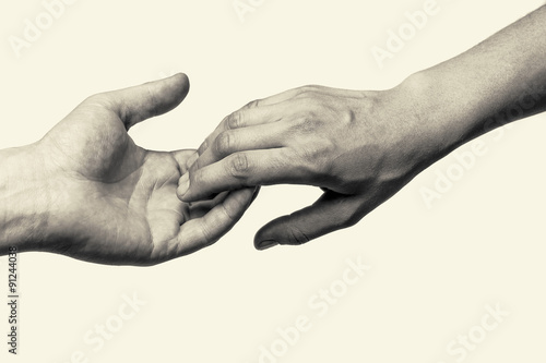 Canvastavla Black and white toned photo with two hands (farewell touch lovers)