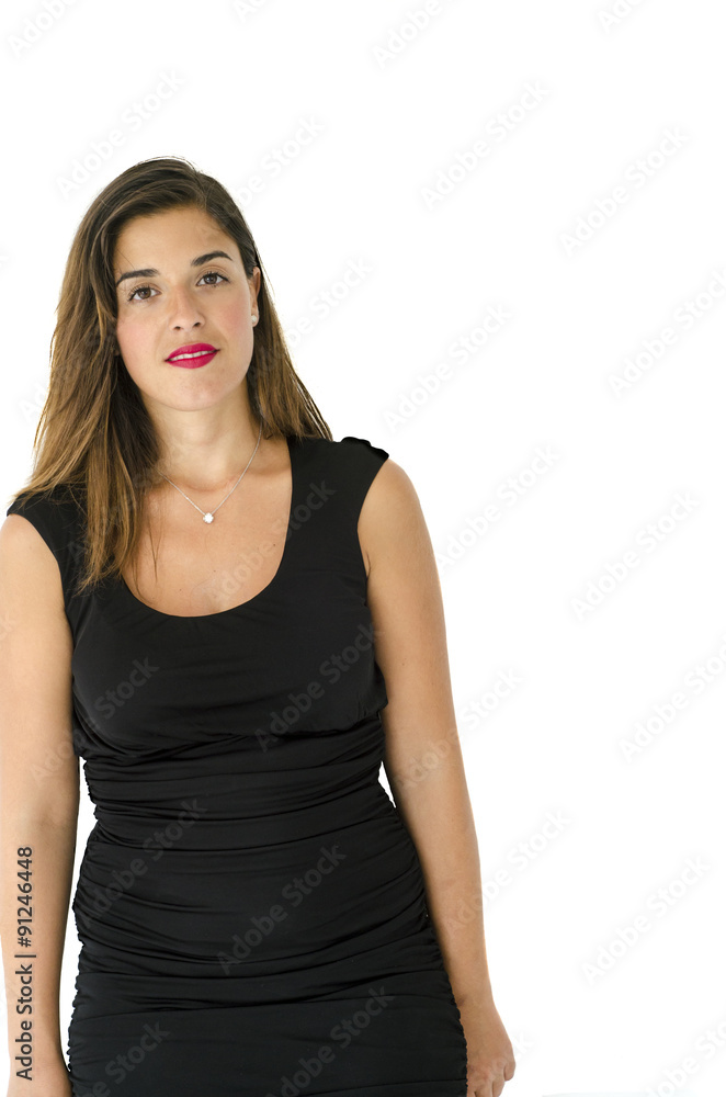 Caucasian girl posing in front of the camera with long hair, black dress, simple makeup Caucasian girl posing in front of the camera with long hair, black dress, simple makeup