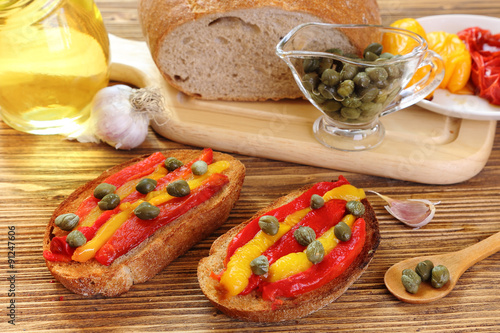 Bruschetta with grilled peppers and capers