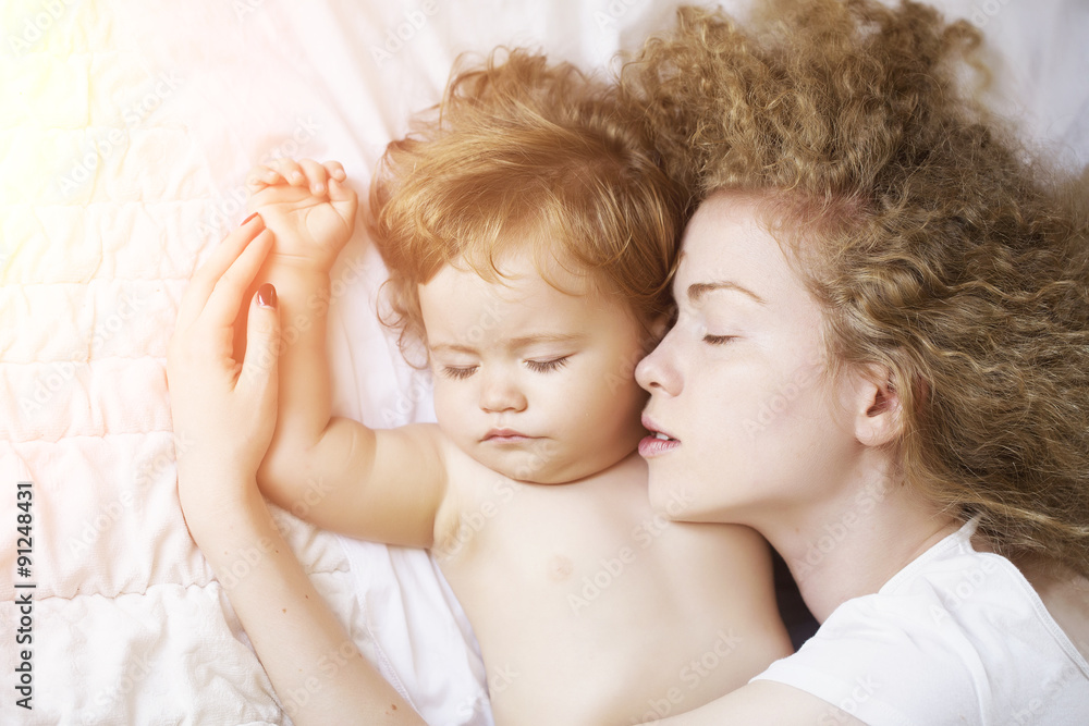 Mother embracing baby Mother embracing baby