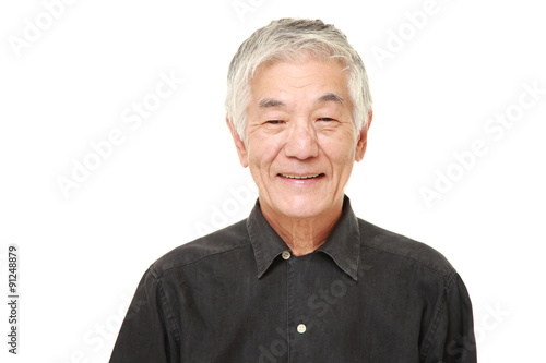 senior Japanese man smiles 