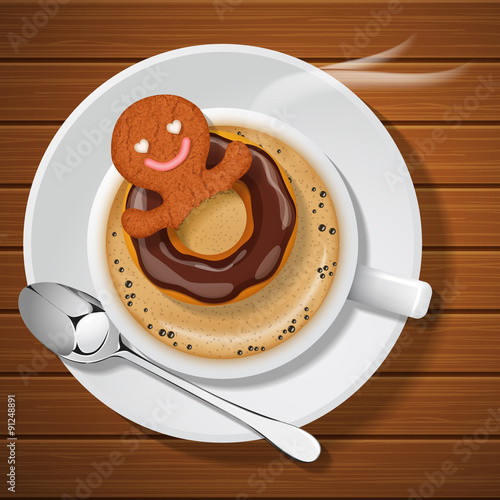 ginger bread with doughnut  in cup of hot coffee