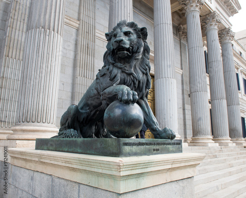 Lion`s statue at the front of  Congress of Deputies of Spain, Madrid