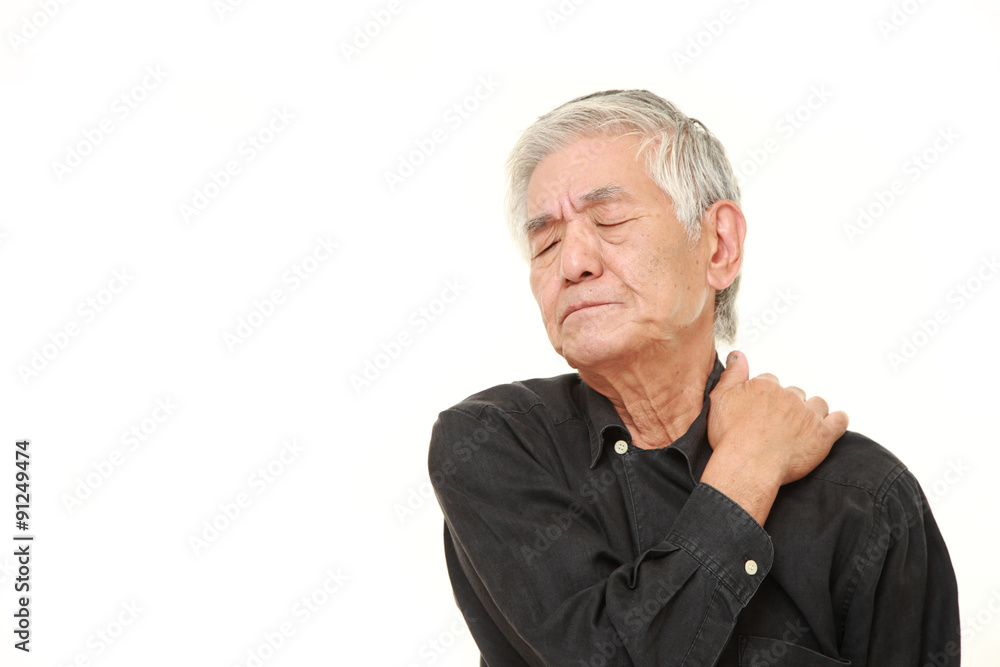 senior Japanese man suffers from neck ache senior Japanese man suffers from neck ache