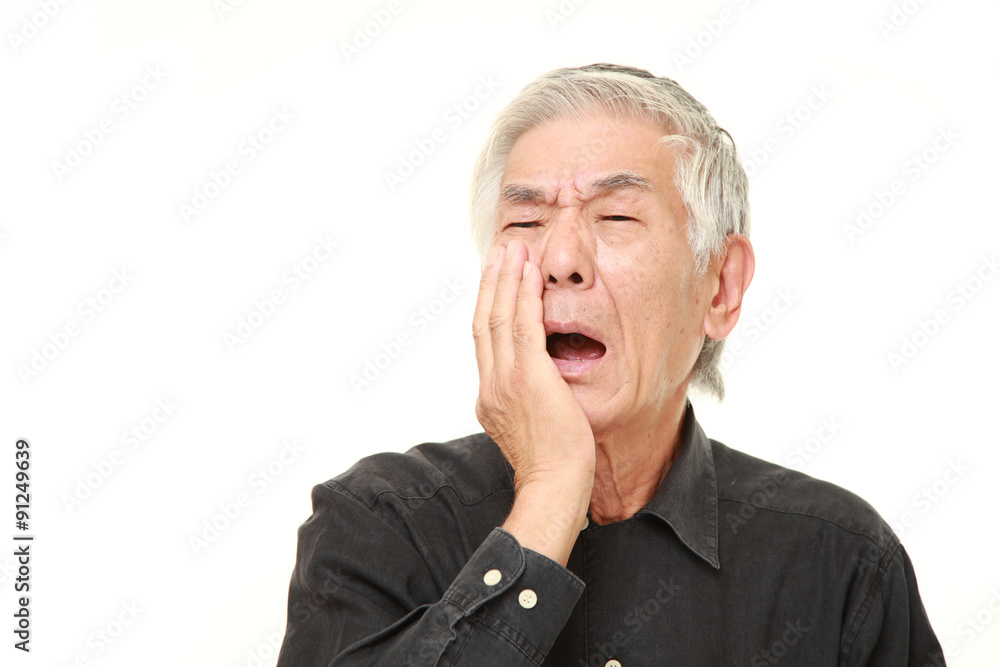 senior Japanese man suffers from toothache senior Japanese man suffers from toothache