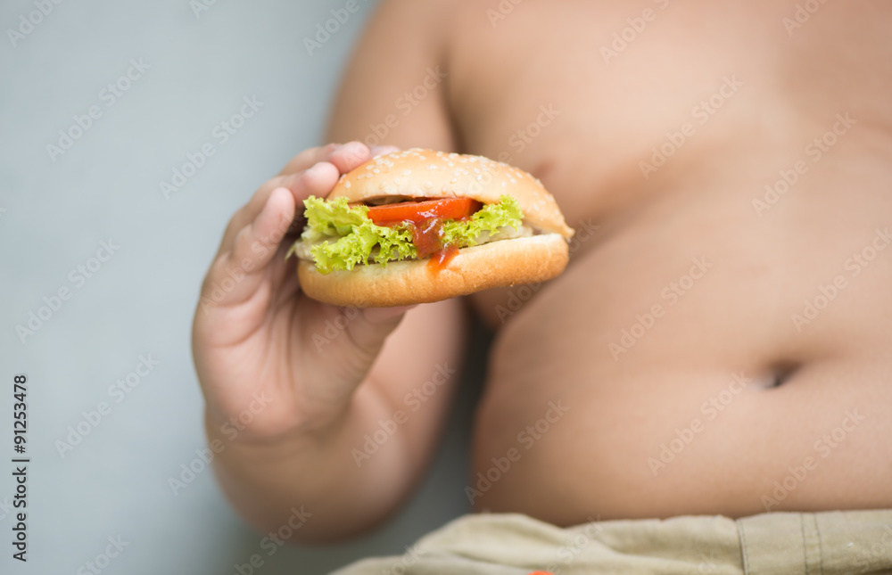 chicken cheese Hamburger on obese fat boy hand chicken cheese Hamburger on obese fat boy hand