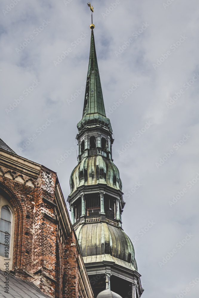 Obraz premium Saint Peters Church is a tall Lutheran church in Riga, Latvia