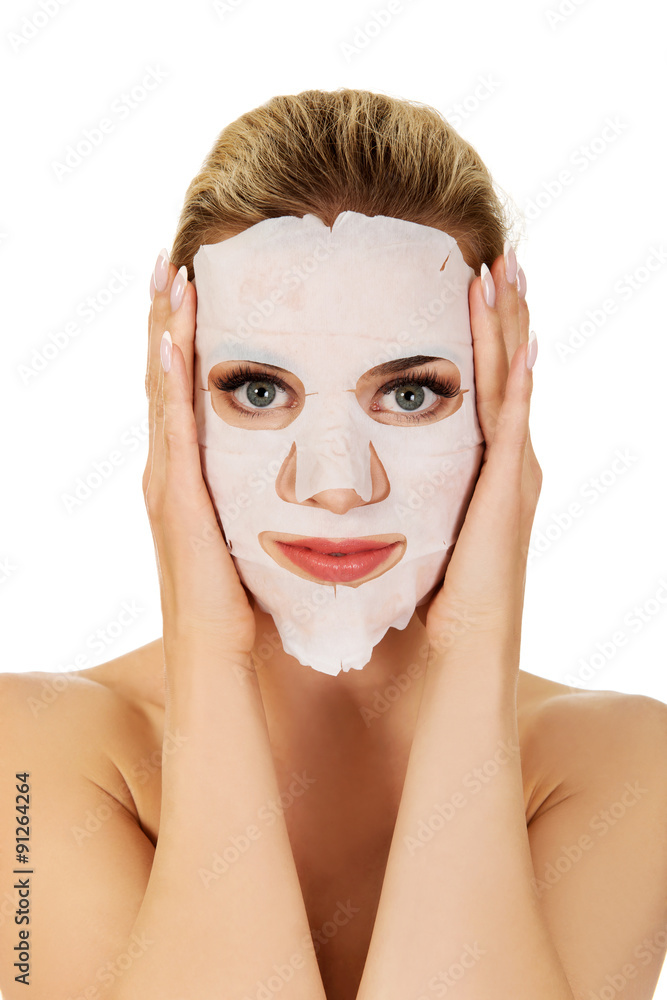 Young woman with facial mask Young woman with facial mask