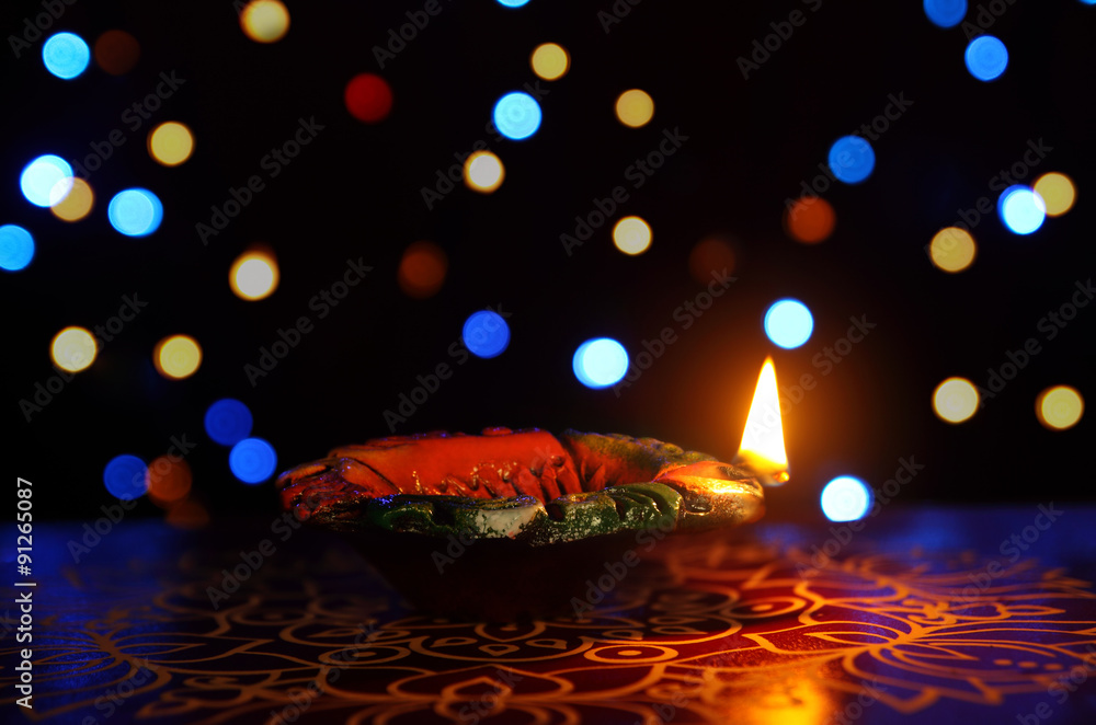 Indian Traditional kolam with Oil Lamp