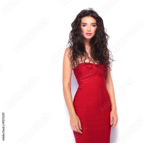 sexy young woman wearing a red dress © Viorel Sima