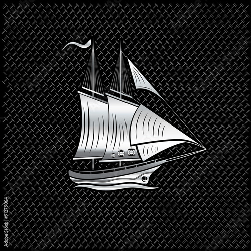 silver sailing ship on metal background