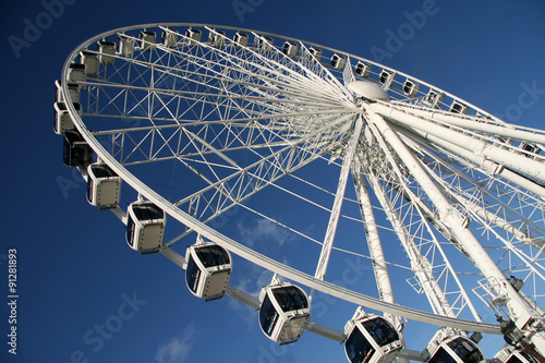 A ferris wheel in Paris, France photo