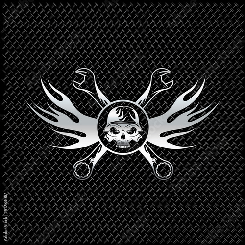silver skull in helmet with flames and wrenches