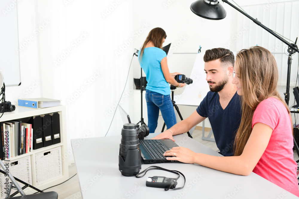 group of young photographer student on photography shooting workshop course indoor in a photo studio