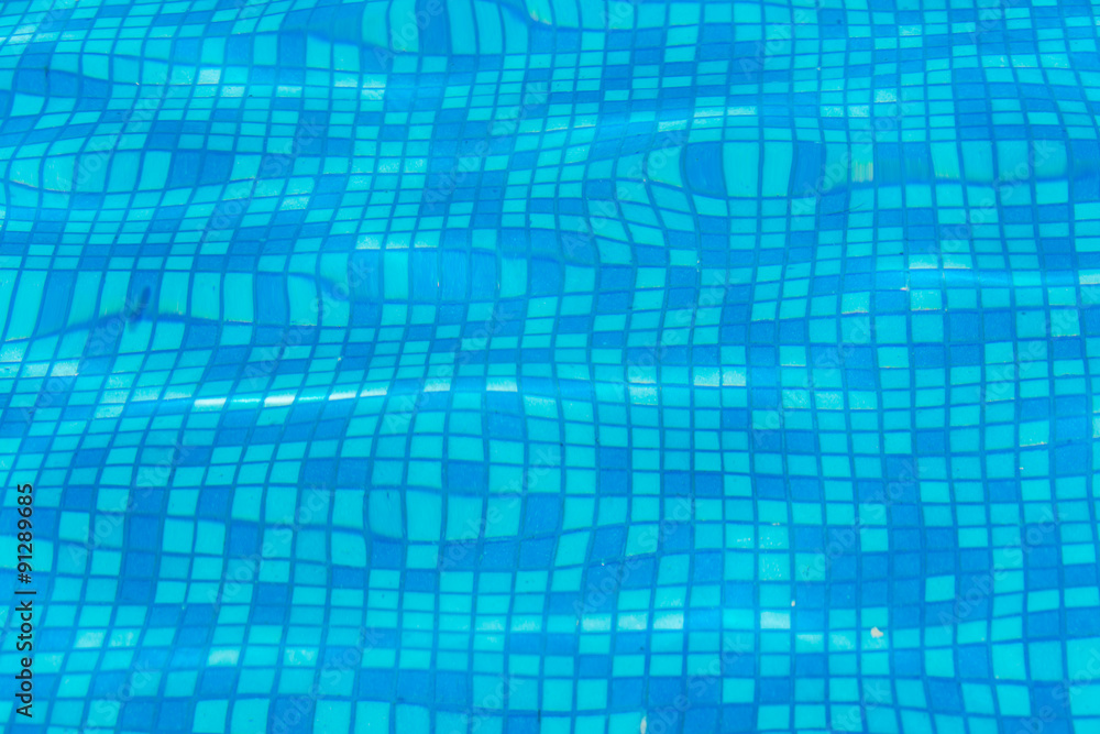 Texture of blue water in the pool Texture of blue water in the pool