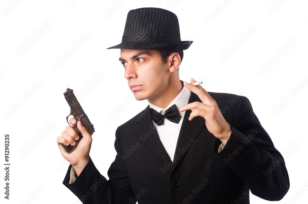 Young elegant man holding handgun isolated on white