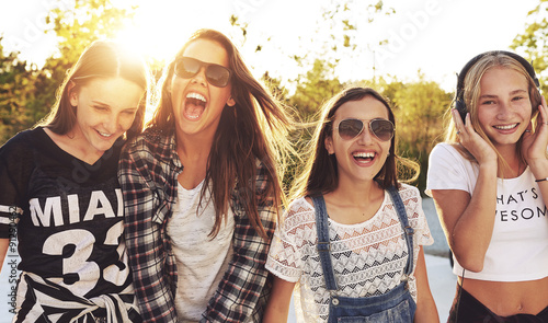 Group of teenagers laughing photo