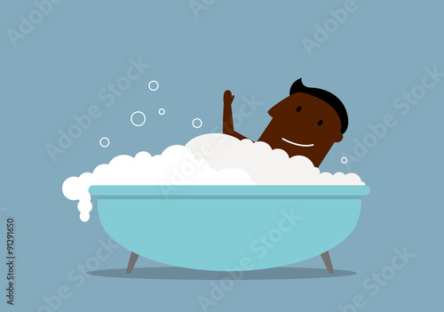 Businessman in a bath with foam