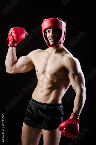 Muscular man in boxing concept © Elnur