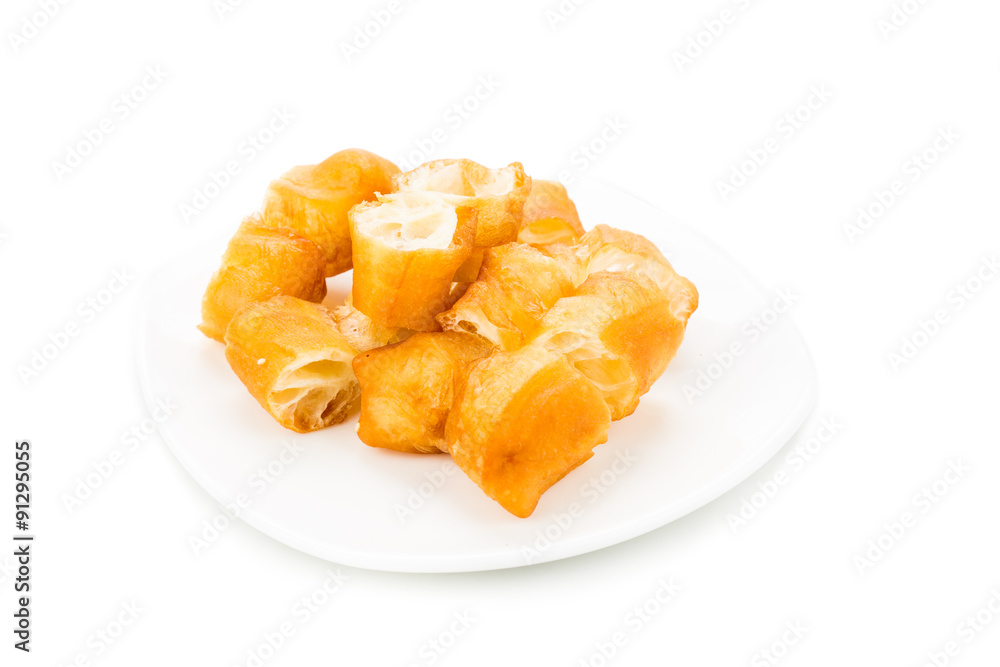 Fried bread stick or popularly known as You Tiao, a popular Chinese delicacy Fried bread stick or popularly known as You Tiao, a popular Chinese delicacy