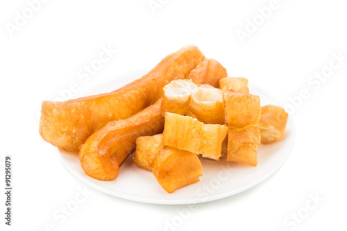 Fried bread stick or popularly known as You Tiao, a popular Chinese delicacy photo