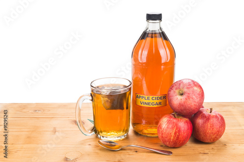 Cuadro en lienzo Apple cider vinegar with brewed tea, natural remedies and cure for common health